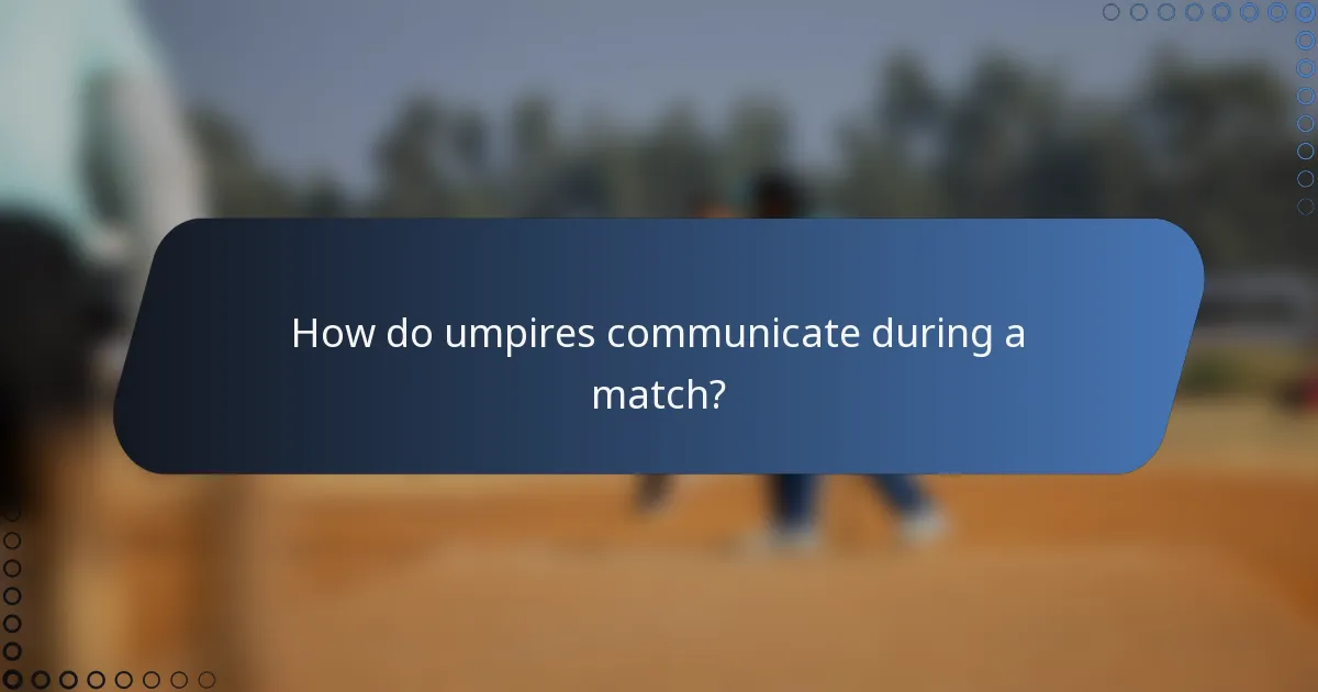 How do umpires communicate during a match?